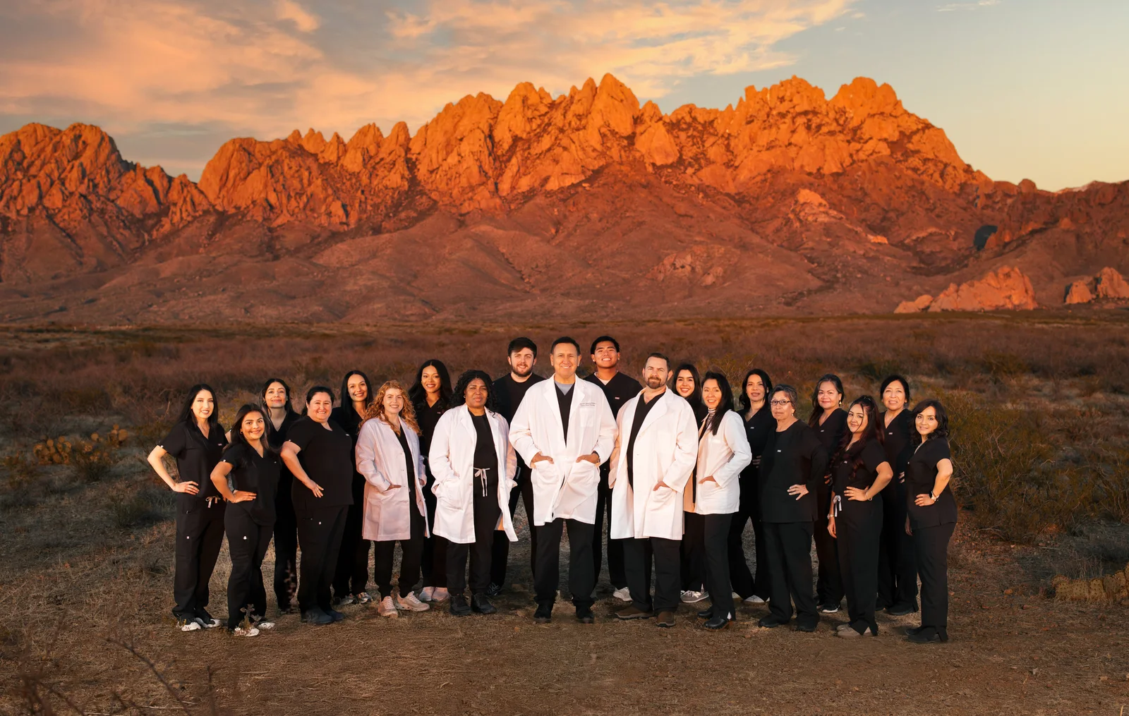 The Covenant Clinics team in front of the Organ Mountains in Las Cruces, New Mexico